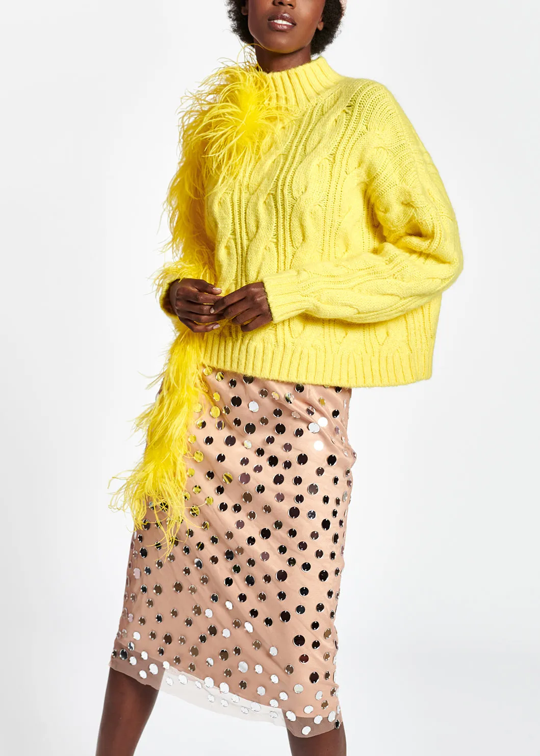 Pastel yellow cable-knit sweater