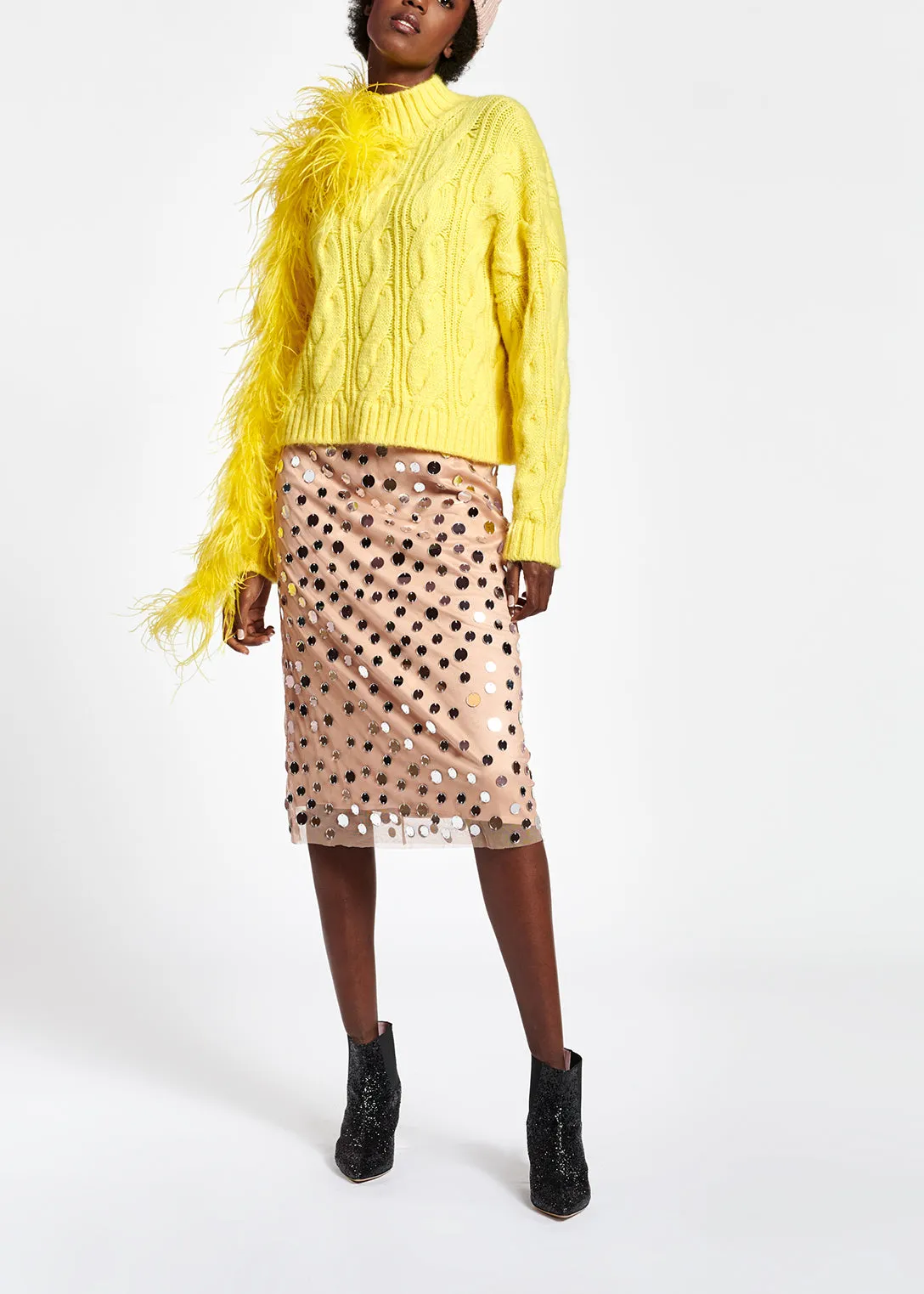 Pastel yellow cable-knit sweater
